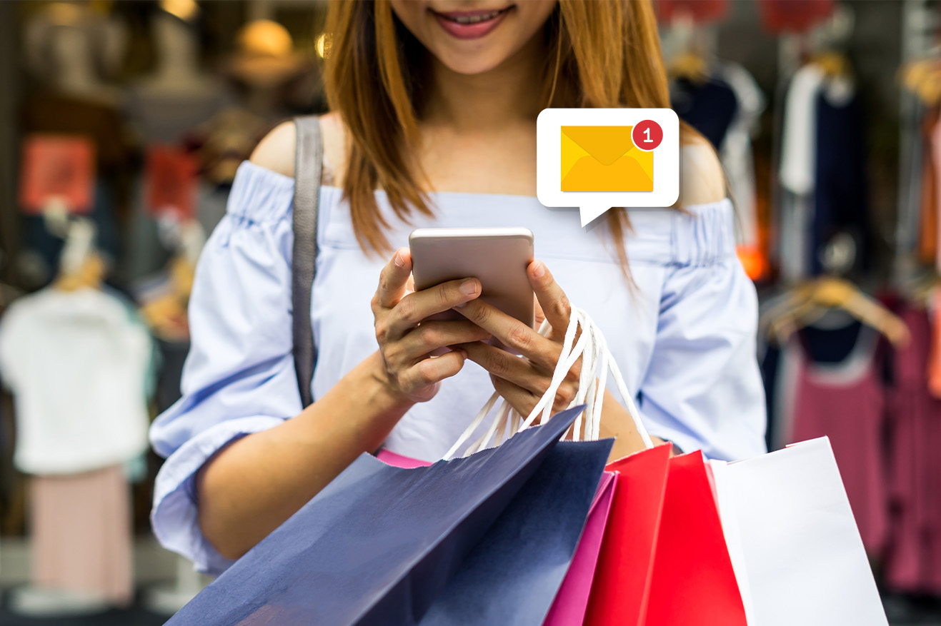 Retail Customer Checking Notification of Loyalty Program on Her Smartphone